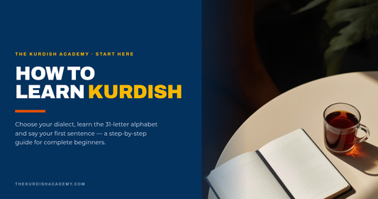 Open notebook and a glass of black tea, with the words How to Learn Kurdish - a beginner's guide by The Kurdish Academy